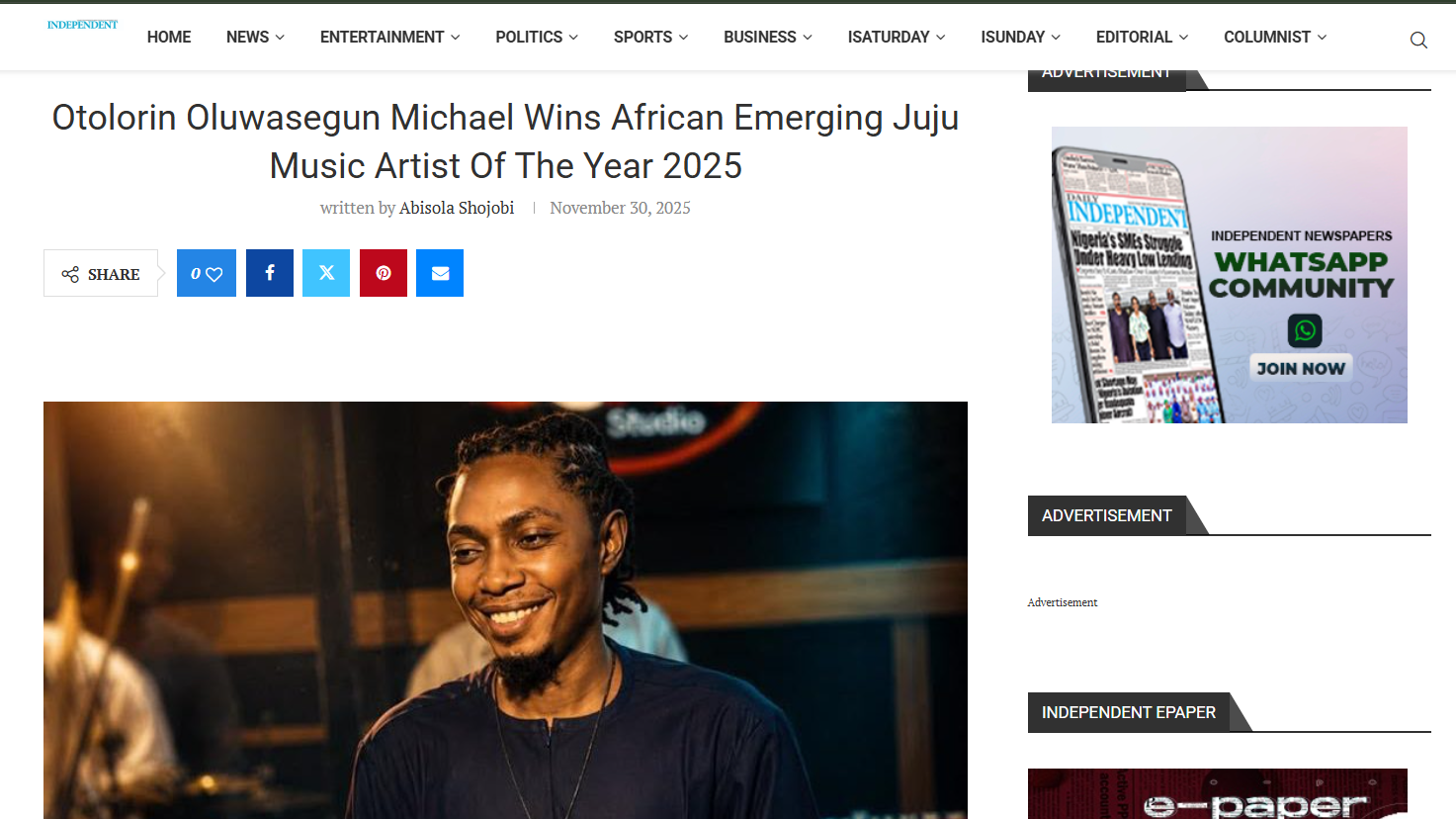 Mr Skylark smiling on stage, the photo run alongside the Independent Nigeria feature